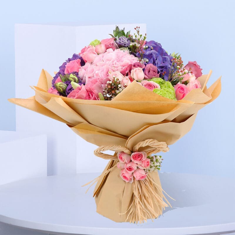 01 eautiful bouquet with pink and purple roses, hydrangeas, and lisianthus.- perfect for any occasion