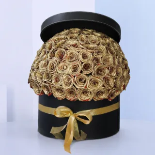 Golden Sprayed Roses In A Black Box