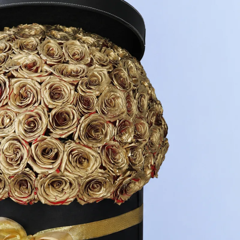 golden sprayed roses in a black box 02