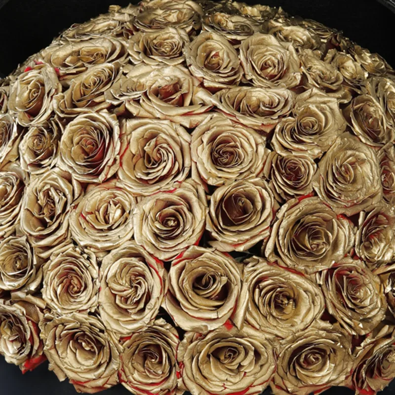 golden sprayed roses in a black box 04