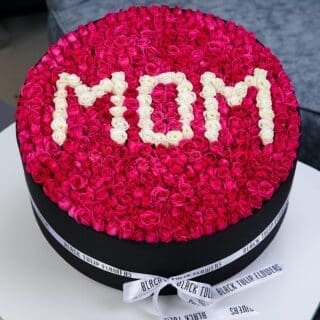 Large Mothers Day Round Red Rose Box Arrangement With name MOM in White Letters