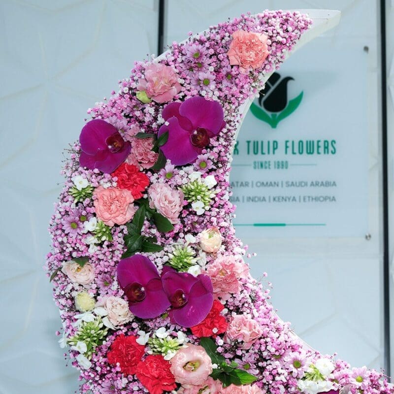 Moonlight Special (2) Moonlight Special crescent flower arrangement by Black Tulip Flowers