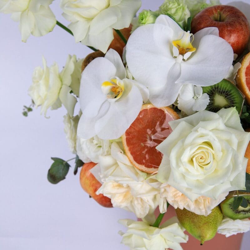 Peaceful Fruit (4) Peaceful Fruit Arrangement composed of mix fruits and flowers in a box by Black Tulip Flowers.