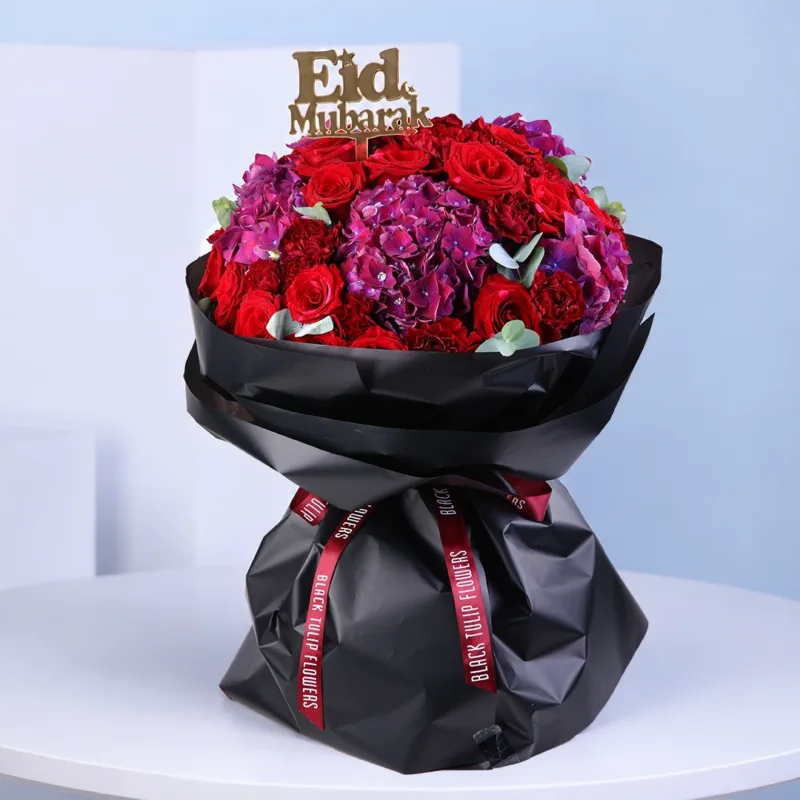appetizing-eid-bouquet_2026 A vibrant bouquet for Eid al-Fitr featuring 25 red roses and 20 red carnations, symbolizing love, joy, and gratitude.
