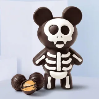 Dark chocolate zombie figure with spooky features, perfect for Halloween treats and decorations.