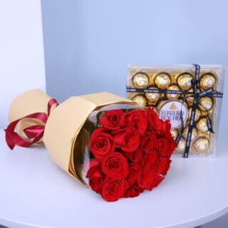 20 stems of radiant red roses, wrapped in brown and tied with maroon ribbon, accompanied by Ferrero chocolates.