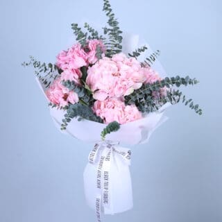 beautiful bouquet of pink hydrangeas and eucalyptus leaves.