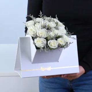 White Spray Rose Premium Envelope Box featuring 6 stems of fresh white spray roses with delicate caspia arranged in a premium white envelope-style flower box.
