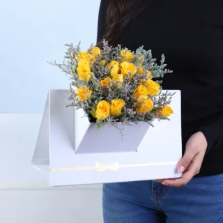 Yellow Spray Rose Floral Envelope Box featuring 6 stems of fresh yellow spray roses with delicate caspia arranged in a premium white floral envelope box.