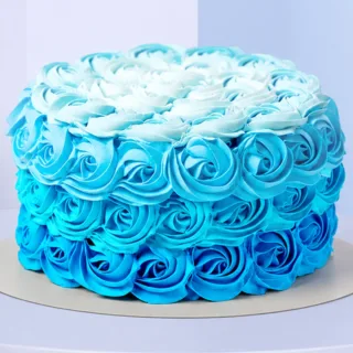 1Kg Blue Rose Swirl Cake decorated with elegant blue buttercream rose swirls, creating a beautiful floral design for birthdays and special celebrations.