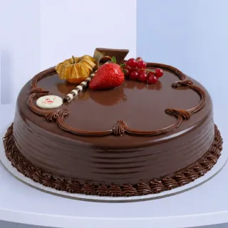 Delicious 1Kg Chocolate Truffle Cake | EL featuring smooth chocolate ganache, rich truffle flavours and an elegant finish for special occasions.