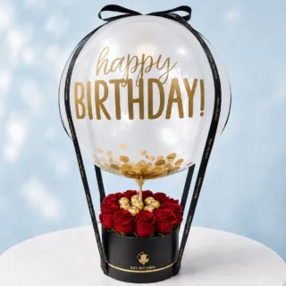 Birthday Rose Chocolate Balloon Combo Box featuring fresh red roses, Ferrero Rocher chocolates, and a Happy Birthday balloon beautifully arranged in an elegant black flower box.