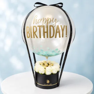 Birthday White Rose Ferrero Box with Happy Birthday Balloon, featuring fresh white roses and delicious Ferrero Rocher chocolates, beautifully arranged in an elegant black gift box for celebrations.