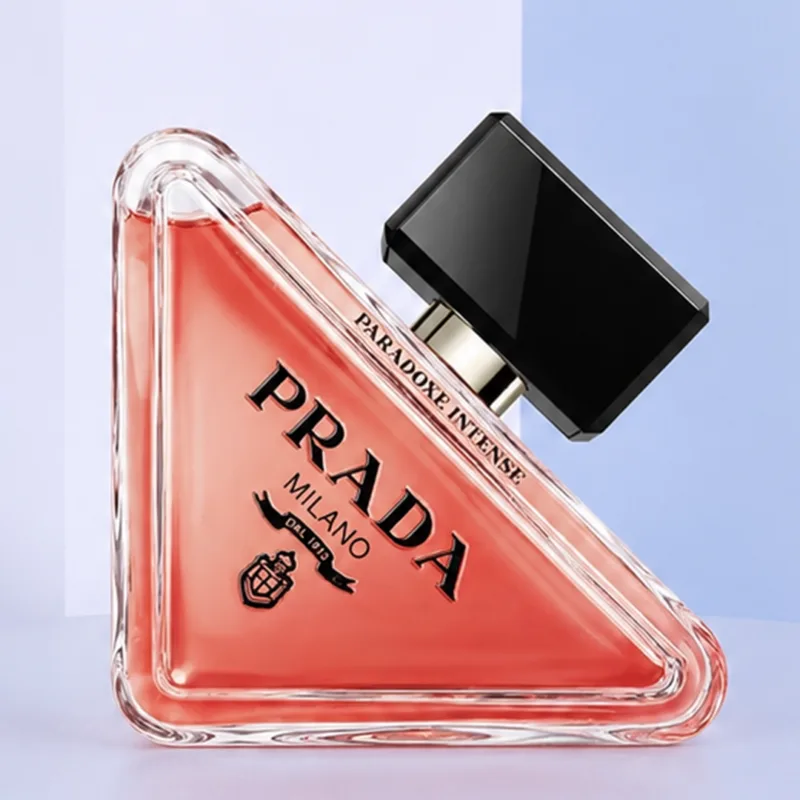 Prada Paradoxe Intense EDP For Women 90ML perfume bottle and box featuring pear, neroli, bergamot, jasmine, amber, and vanilla notes.