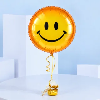 Smiley Face helium foil balloon with cheerful yellow design, perfect for birthdays, parties, celebrations, gifting, surprises, decorations, and special occasions with family and friends.