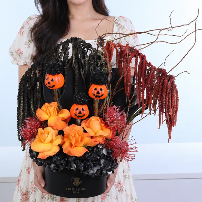 spooky-night-forest Spooky Night Forest Halloween flower arrangement featuring painted hydrangeas, Confidential roses, Cordifolium foliage, hanging Amaranthus, a wooden stick, and three stems of painted Ping Pong flowers.