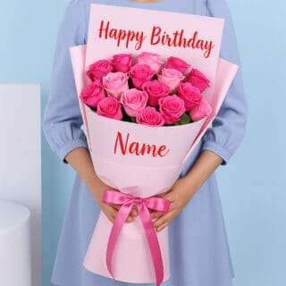 BTF Home 21 A bouquet of pink roses, wrapped in soft pink, featuring “Happy Birthday” at the top and a personalized name at the bottom. A pink ribbon is tied in a bow around the bouquet.