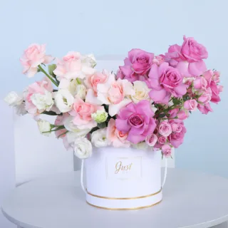 BTF Home 36 Purple & Pink Rose Hat Box featuring fresh purple roses, light pink roses, white lisianthus, purple spray roses, and delicate fillers beautifully arranged in a premium white hat box.